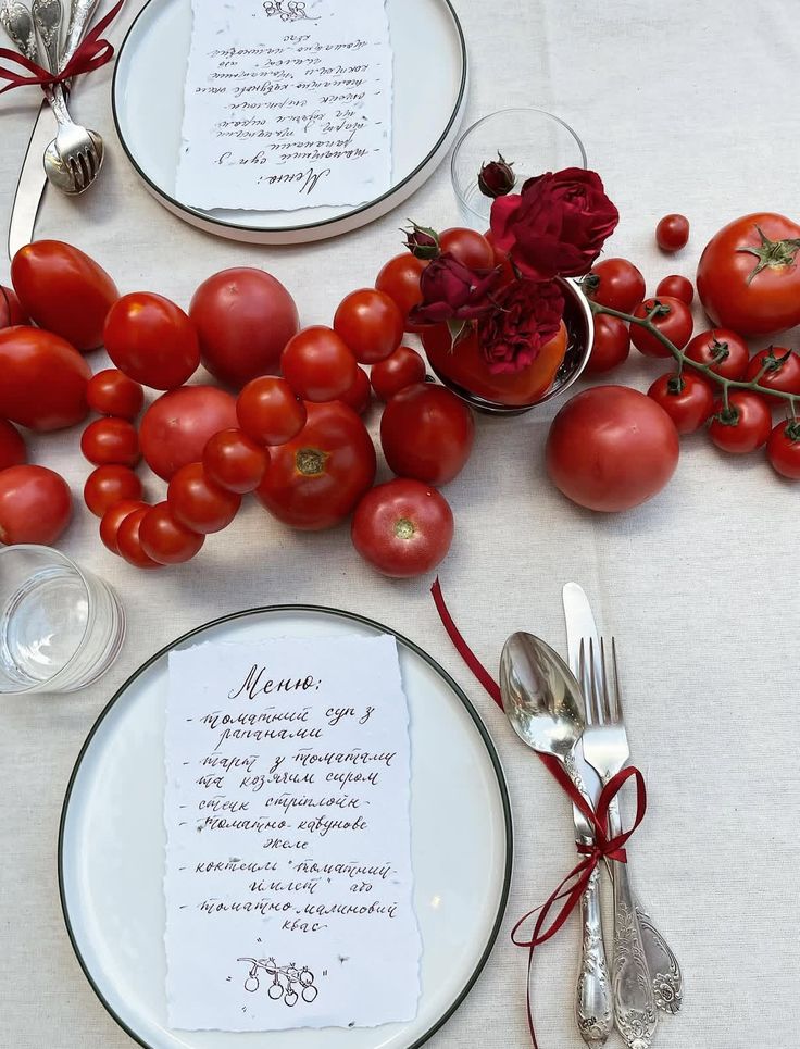 Wedding table decorated with tomatoes instead of flowers, with a handwritten menu